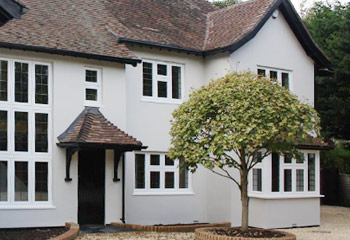 Timber Flush Casement windows with leaded lights and doors for this grand 1920’s Cottage in Woking, Surrey